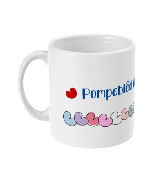 Witte mok met pompeblêd en tekst fan myn hert